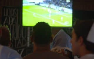 People watching sport shown in the pub